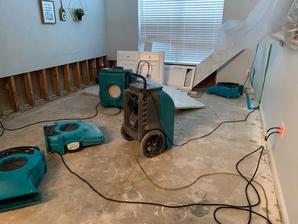 Dehumidifier in flood-cut room for Water Damage Restoration in Deer Park